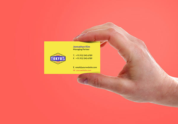 free-hand-holding-business-card-mockup-2